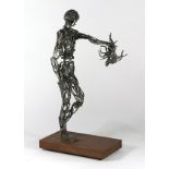 Folk Art nail sculpture attributed to John Jagger, 20th Century, depicting Perseus grasping the head