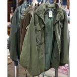 (Lot of 5) United States military issued jackets, including (2) Eisenhower jackets one having a