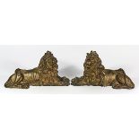 Pair of patinated bronze figural sculptures, depicting a recumbent lion, each in classic pose,