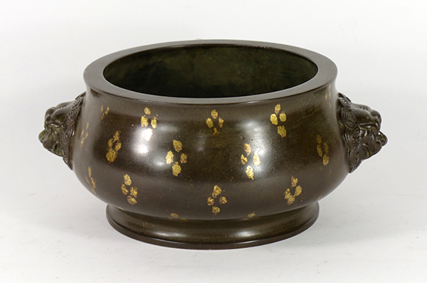 Chinese 'gold splashed' bronze censer, the compressed body with flower patterns and flanked with