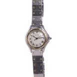 Cartier lady's Cougar two-tone wristwatch Dial: round, black Roman numerals, aperture at 3 o'clock