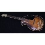 Kay Kraft Musical guitar, circa 1935, accented with Venetian style gilt scrollwork, 40"h x 14.5"w