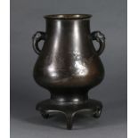 Japanese bronze jar, Meiji period, zoomorphic handles on a compressed bulbous body above the