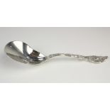 Tiffany & Company sterling silver berry spoon in the multi-motif "Strawberry Pierced" pattern, 1875,