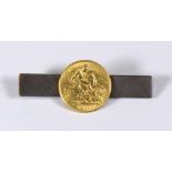 British half sovereign gold coin, sterling silver tie bar featuring one British 1/2 sovereign, 1911,