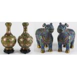 (lot of 4) Pair of Chinese cloisonne mythical beasts, in formal stance on all fours, the turquoise