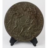 Classical style bronze medallion relief plaque, 19th Century, depicting Adam and Eve conversing with