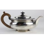 English Georgian sterling teapot by Benjamin Smith, London, 1823, accented by gadrooning and