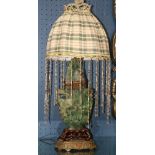 Antique Chinese green quartz urn form lamp with a green plaid shade accented with beads, 28"h.