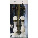 Pair of rock crystal lamps mounted with brass fittings, and double light sockets, 30"h. Provenance: