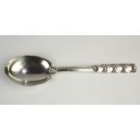 Tiffany & Company sterling silver "Tomato/Exposition" pattern serving spoon, 1933, 10"l, 4.46 troy