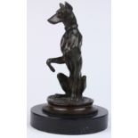 French bronze figural statue of a Doberman Pinscher, inscribed "Barye", the whole rising on a