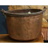 French copper candy pot, the large form having a wrought handle