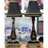 Pair of French Empire style gilt bronze and ebonized wood lamps with shades, each having a