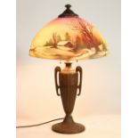 American reverse painted scenic table lamp, possibly Jefferson or Miller, the shade depicting a