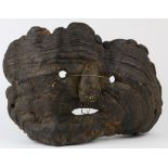 Himalayan Nepalese burlwood mask, late 19th/early 20th century, portraying a frightening wrinkled