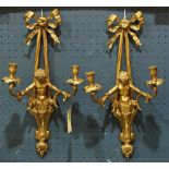 Pair of Neo-Classical style bronze two-light figural sconces. each surmounted with ribbon bows above