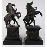 Pair of Grand Tour style bronze Marly horse sculptures, after Guillaume Coustou, French (1677-1746),