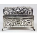 Peruvian sterling silver repousse trinket box mounted with a hinged cover centered with a