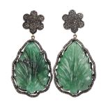 Pair of carved emerald, diamond and silver ear pendants featuring (2) carved emerald leafs measuring