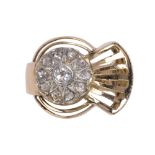 Retro diamond, 18k yellow gold and platinum ring featuring (1) old mine cut and (10) rose cut