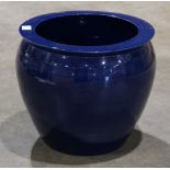 Chinese cobalt blue glazed ceramic fish bowl, with an everted rim and rounded tapering body, with