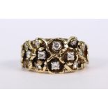 Diamond and 14k yellow gold ring featuring (14) full cut diamonds, weighing a total of approximately