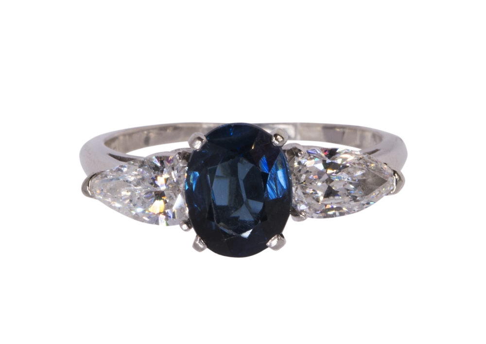 Sapphire, diamond and platinum ring centering (1) oval-cut sapphire weighing approximately 1.60