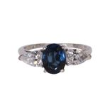 Sapphire, diamond and platinum ring centering (1) oval-cut sapphire weighing approximately 1.60