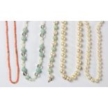 (Lot of 5) Coral, rock crystal quartz and bead jewelry including one 37 inch strand of (88) off