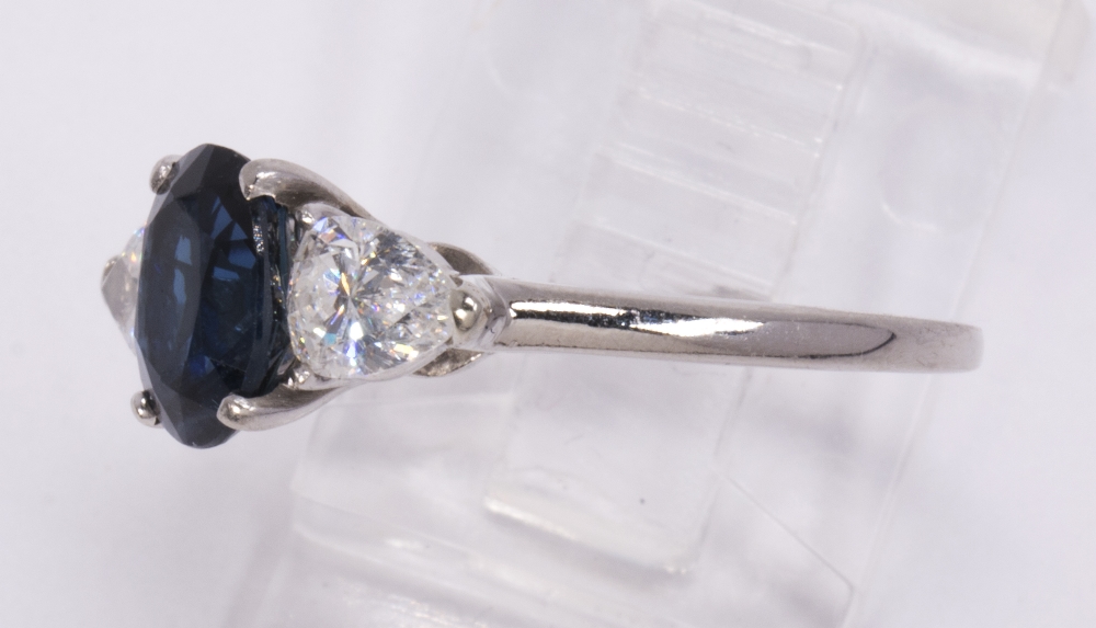 Sapphire, diamond and platinum ring centering (1) oval-cut sapphire weighing approximately 1.60 - Image 2 of 3