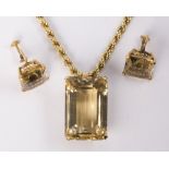 Citrine and 14k yellow gold jewelry suite including (1) emerald-cut citrine weighing approximately