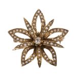 Victorian diamond, seed pearl and 14k yellow gold pendant-brooch centering one old mine cut diamond,