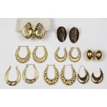 (Lot of 8) Pairs of yellow gold earrings comprised of one pair of 18k yellow gold oval dome earrings