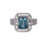 Blue zircon, diamond and 14k white gold ring highlighting (1) emerald-cut blue zircon weighing 4.