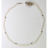 Freshwater cultured pearl and sterling silver necklace composed of (58) freshwater cultured pearls