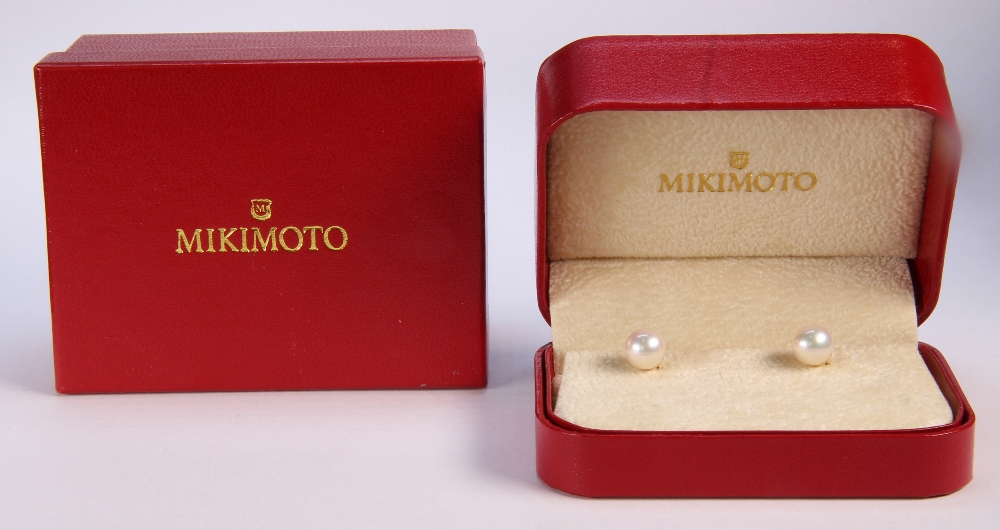 Pair of Mikimoto cultured pearl and 18k yellow gold earrings featuring (2) cultured pearls measuring