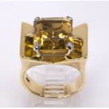 Citrine and 14k yellow gold ring centering one emerald cut citrine measuring approximately 13.7 x