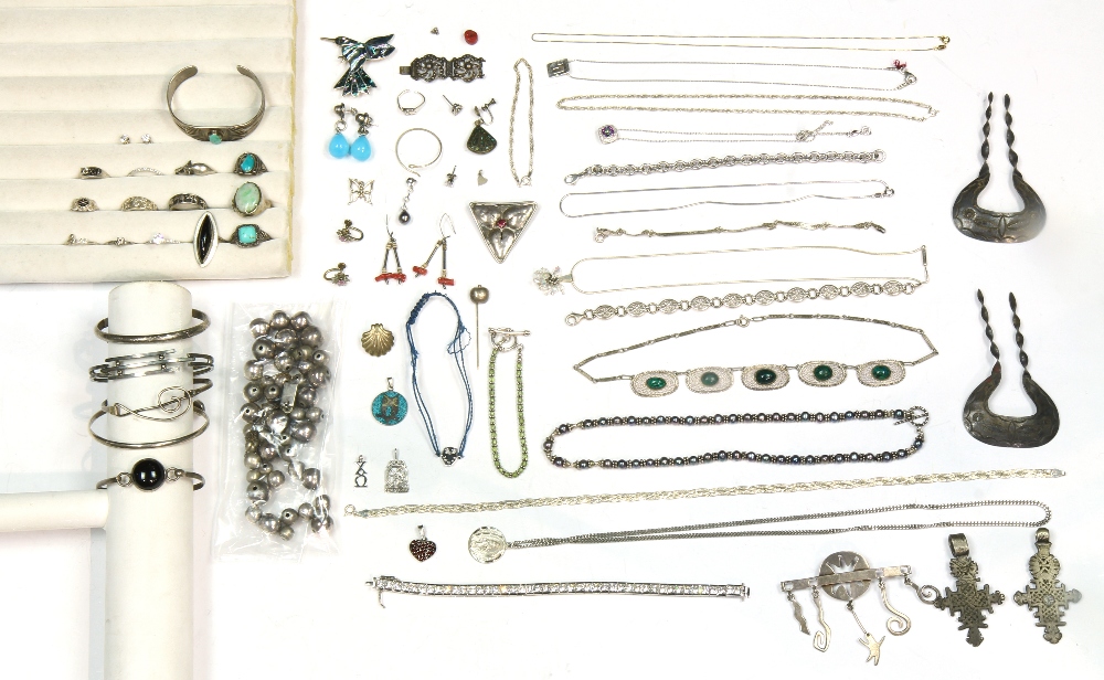 Collection of multi-stone, glass, sterling silver and silver jewelry including (2) Native American