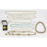 Collection of costume jewelry including (2) imitation pearl necklace; one aventurine quartz bead