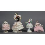 (lot of 4) German crinoline porcelain figural groups, each having formal attire with crinoline