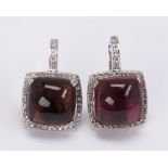 Pair of tourmaline, diamond and 18k white gold earrings featuring (2) square pink tourmaline