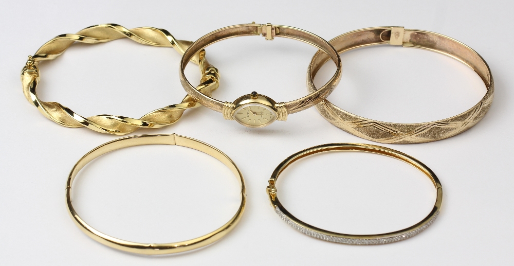 (Lot of 5) Diamond and yellow gold bracelets comprised of one 14k yellow gold hinged bangle, - Image 2 of 2