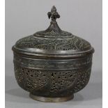 Indian copper alloy censer, with flower shaped finial on the lid, extensive pierced work on both lid