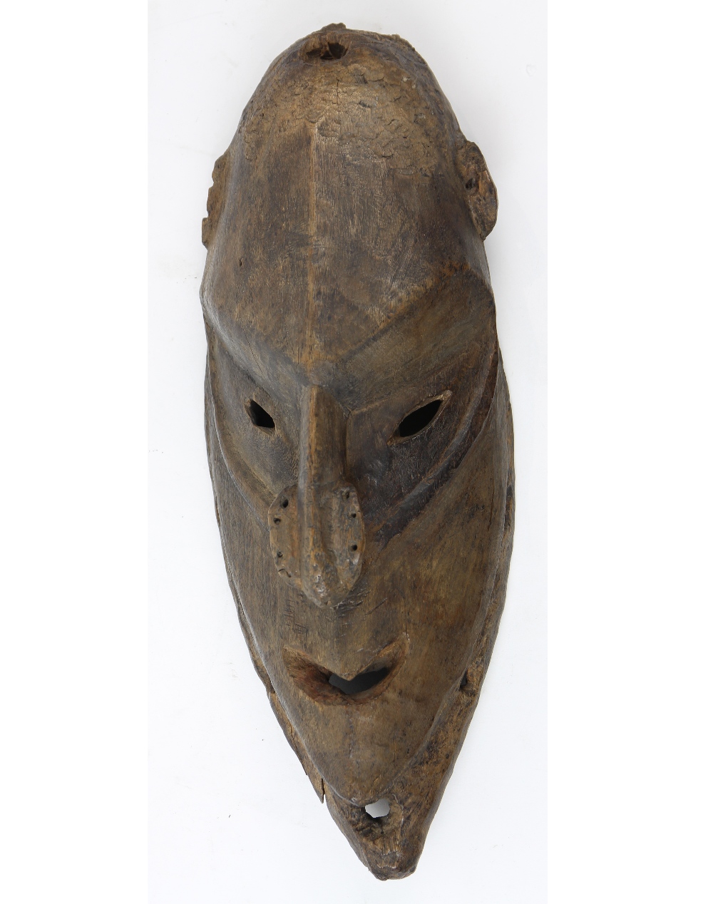 Papua, New Guinea old and much used heavy, thick carved wood mask, heavily patinated on back,