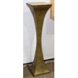 Art Deco brass weighted pedestal, having a square top continuing to the tapered body and rising on a