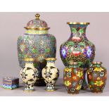 (lot of 7) Chinese cloisonne items, consisting of a jar, five vases and a fan shaped box with