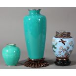 (lot of 3) A Japanese cloisonne canister with sparrow, butterfly and flowers on a light blue ground,