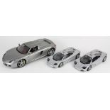 (lot of 3) Model car group, consisting of (2) die cast McLaren 1/18 models, and a plastic Porsche GT