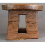 Nupe People, Nigeria carved blonde wood stool having a honed circular seat on a geometric base, 9"